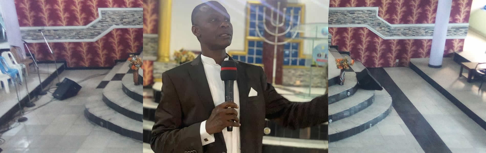 Pastor Okey Akiri at Oil of Joy Ministries Internation Inc.